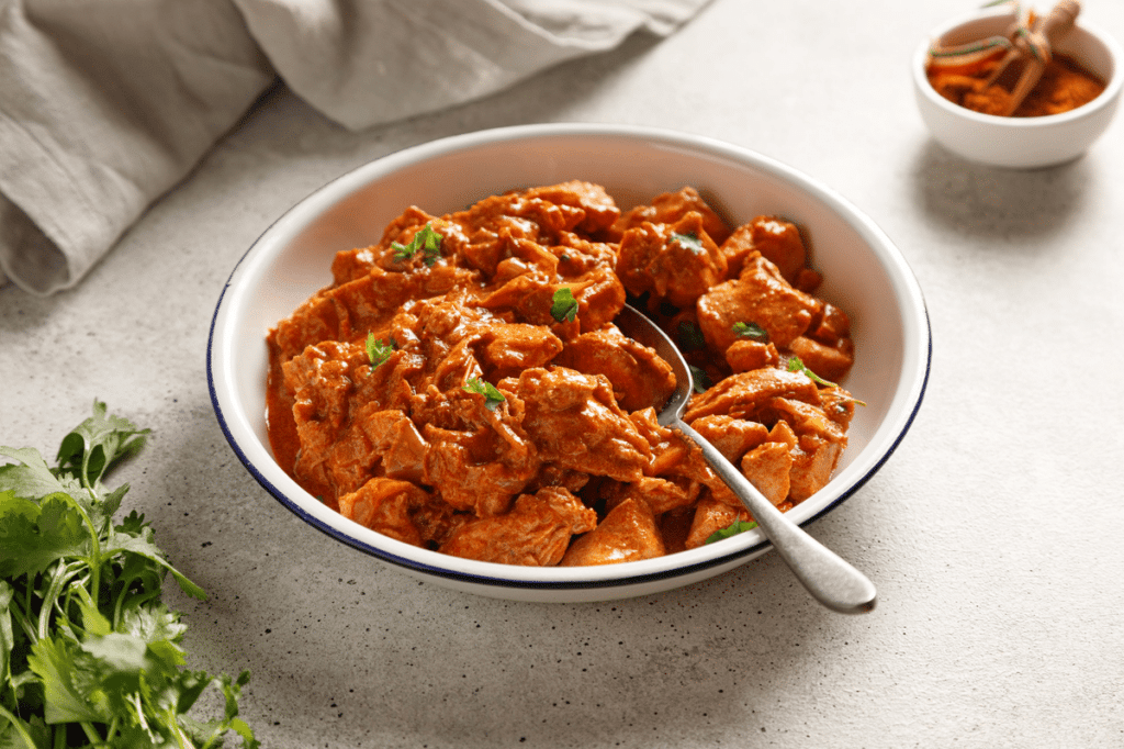 Frango ensopado com molho de tomate